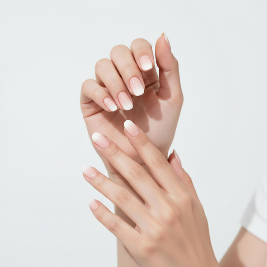 Close-up of two happy hand with light pink nail polish on a light gray background Salon ready manicure Fake extensions Press on sticky artificial nails from happyhands8. 
Happy hands 8 nails ready like salon manicure