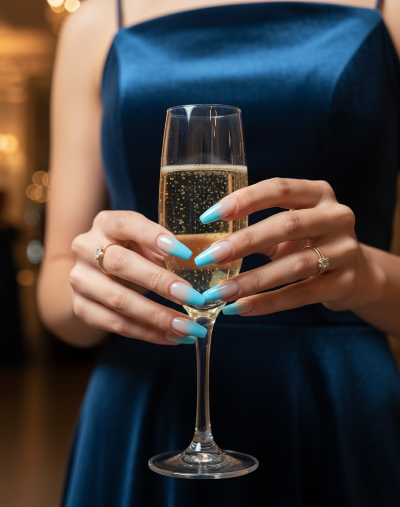Lady  holding a glass of champagne with a blurred background Salon ready manicure Fake extensions Press on sticky artificial nails from happyhands8 

Happy hands 8 nails ready like salon manicure
